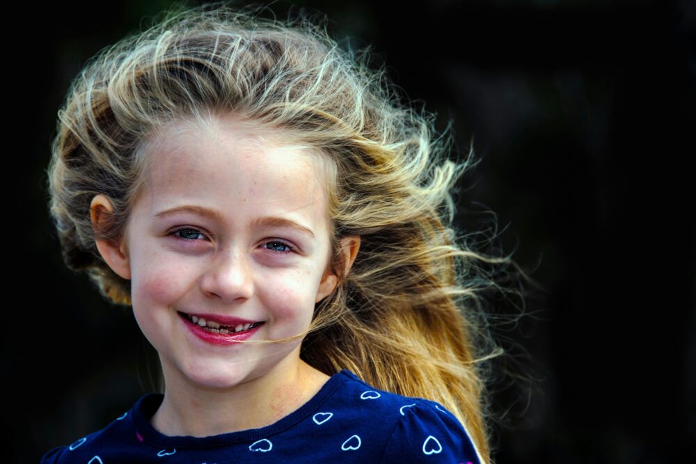 Young girl smiling at the camera