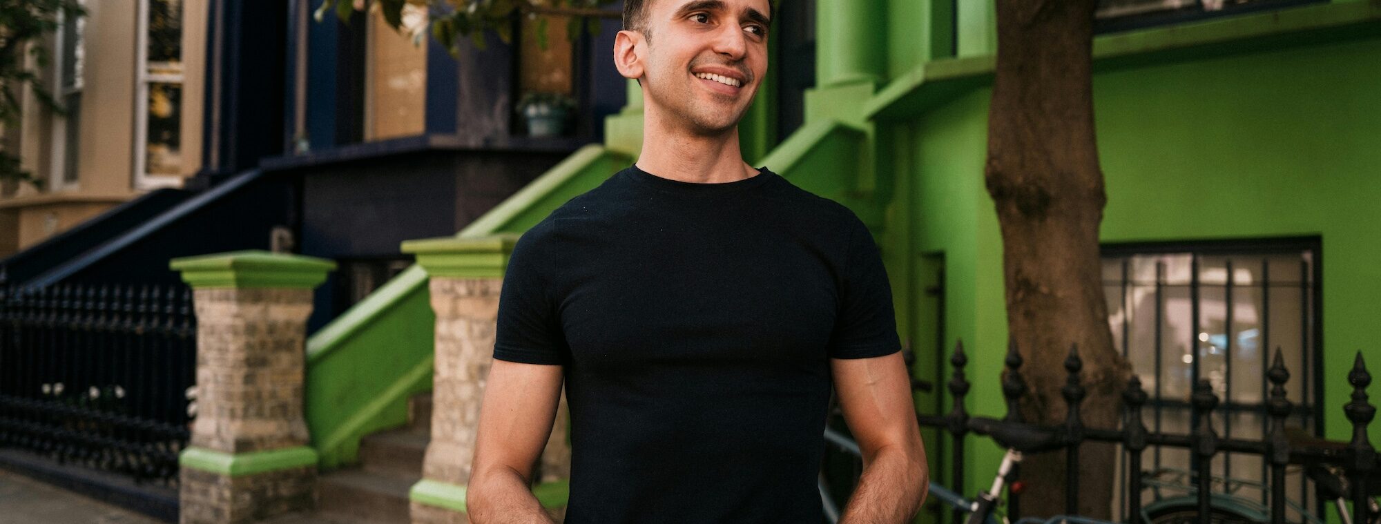 Man smiling on the street