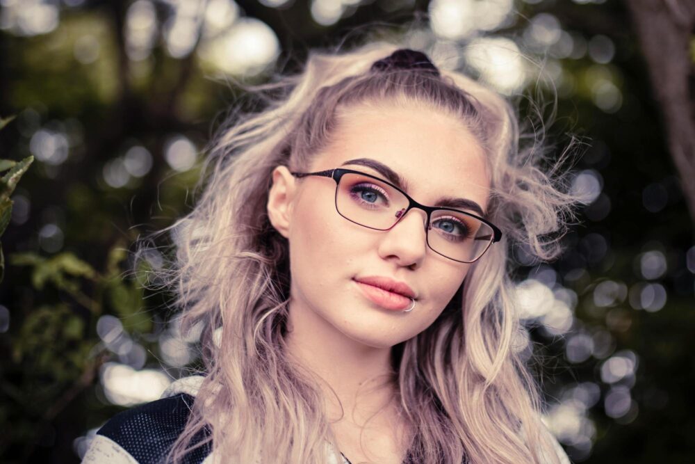 a young woman with glasses