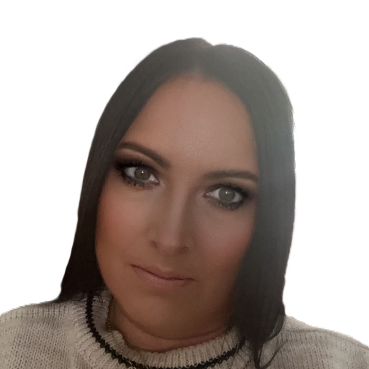 Close-up headshot of woman with dark straight hair, smoky eye makeup and neutral lips on white background